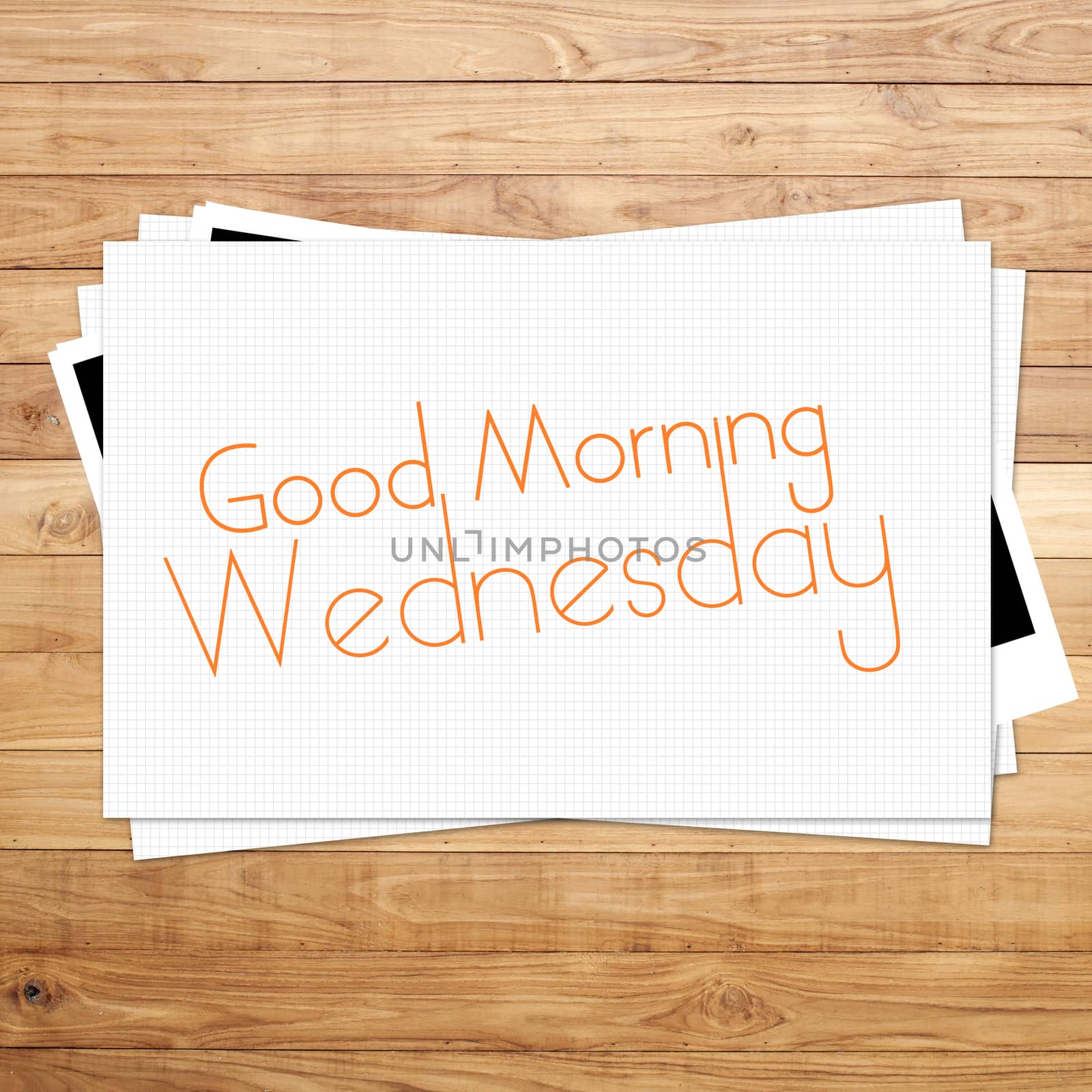 Good Morning Wednesday on paper and Brown wood plank background by 2nix