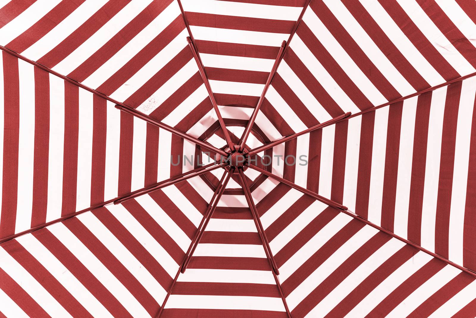 Red and white umbrella beach