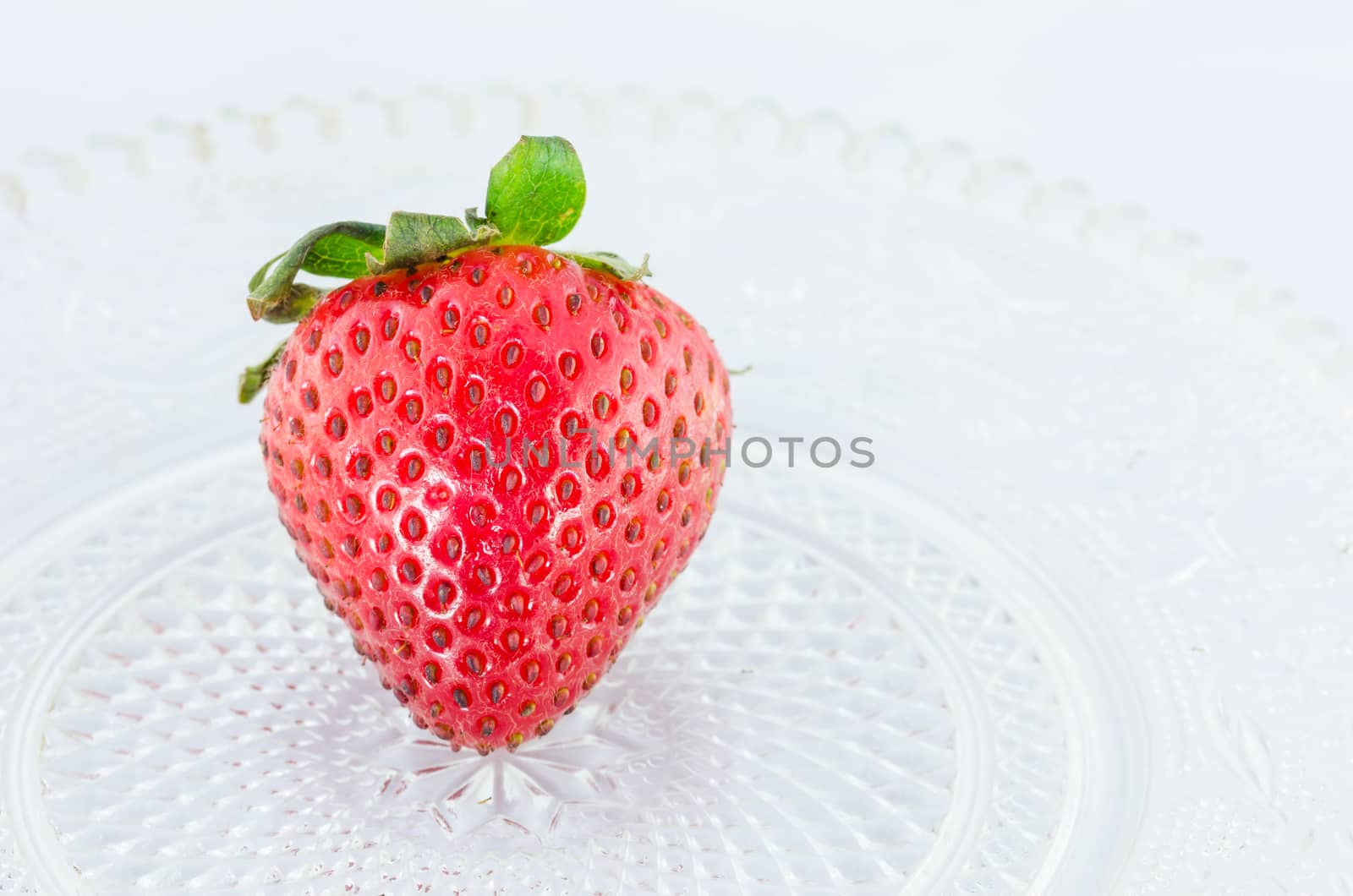 Organic Strawberry fruits nature on the glass dish