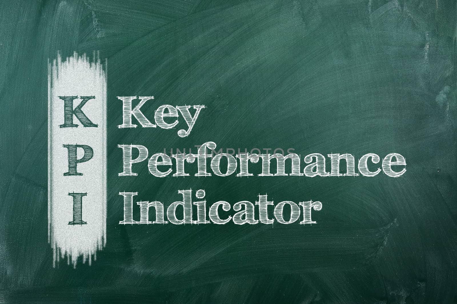 key performance indicator,KPI written on green  chalkboard