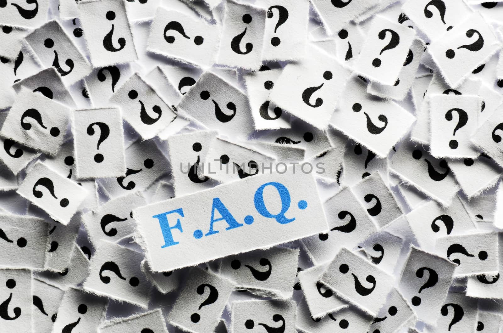 FAQ  question marks on white papers -hard light