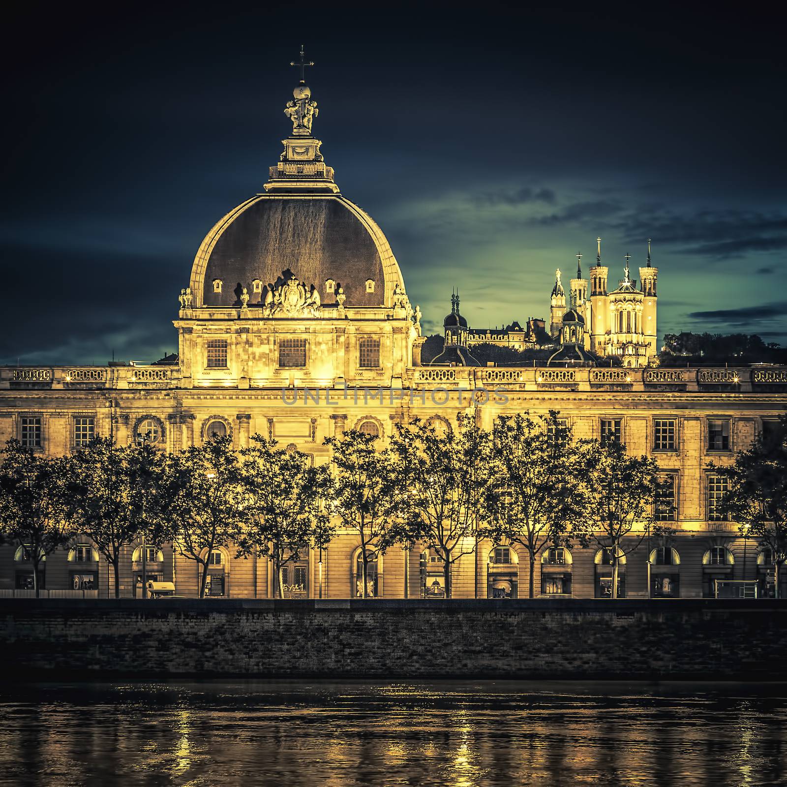 View of Lyon at sunset with Rhone river by vwalakte