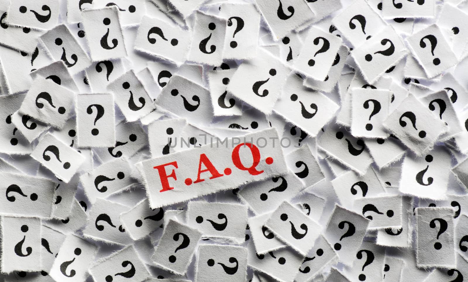  FAQ  question marks on white papers -hard light