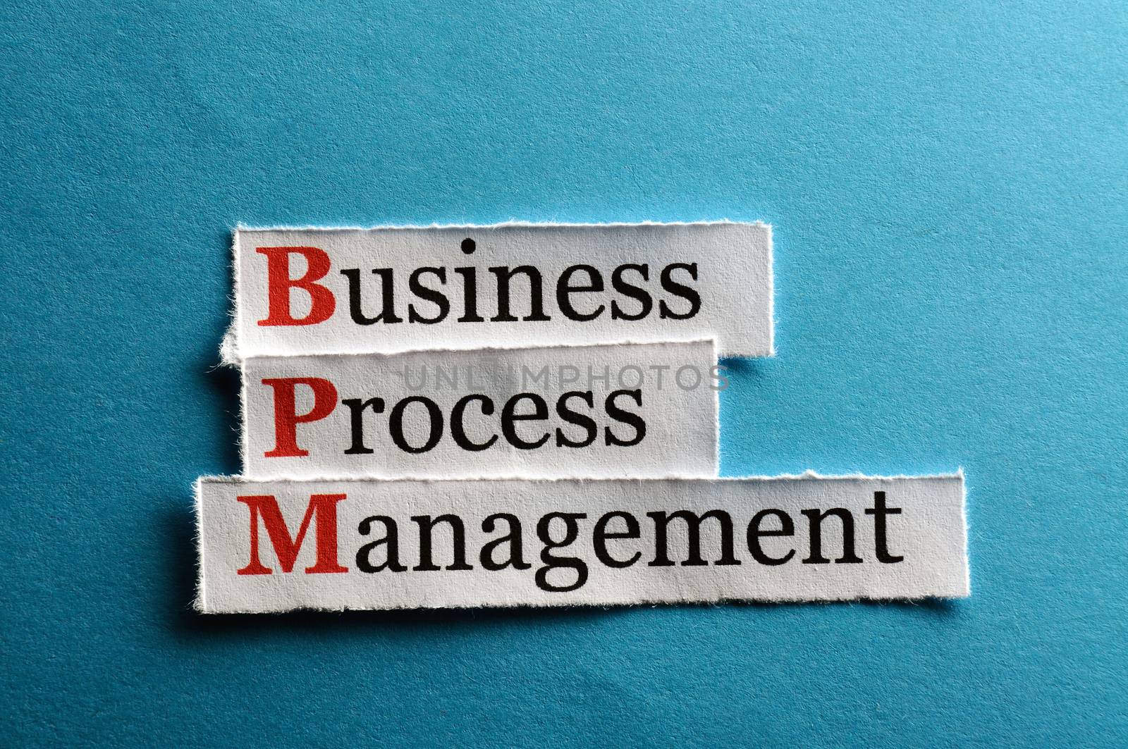 BPM business process management on blue paper