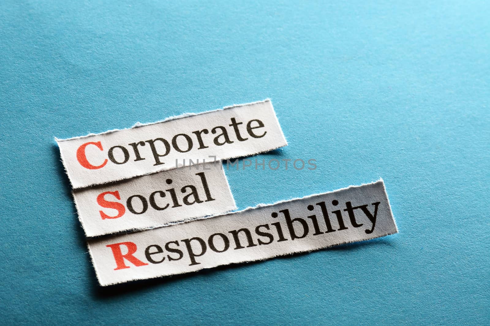 Corporate social responsibility (CSR) concept on paper