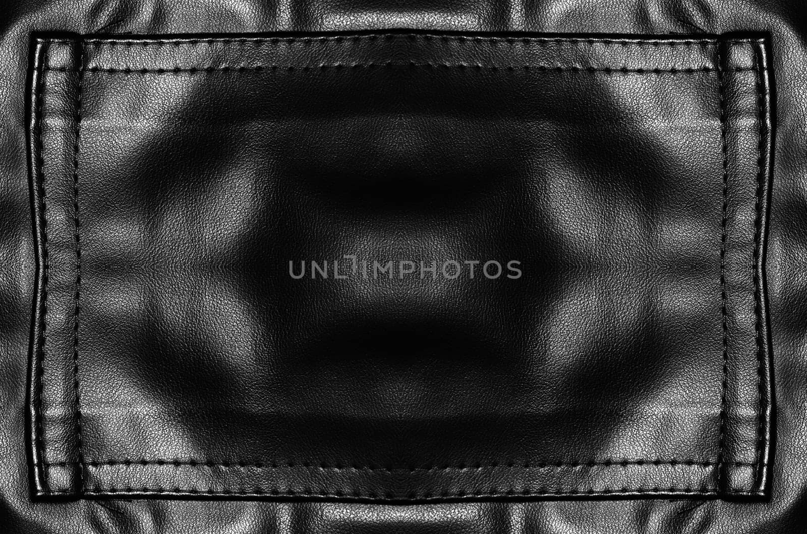 Closeup of seamless black leather texture 