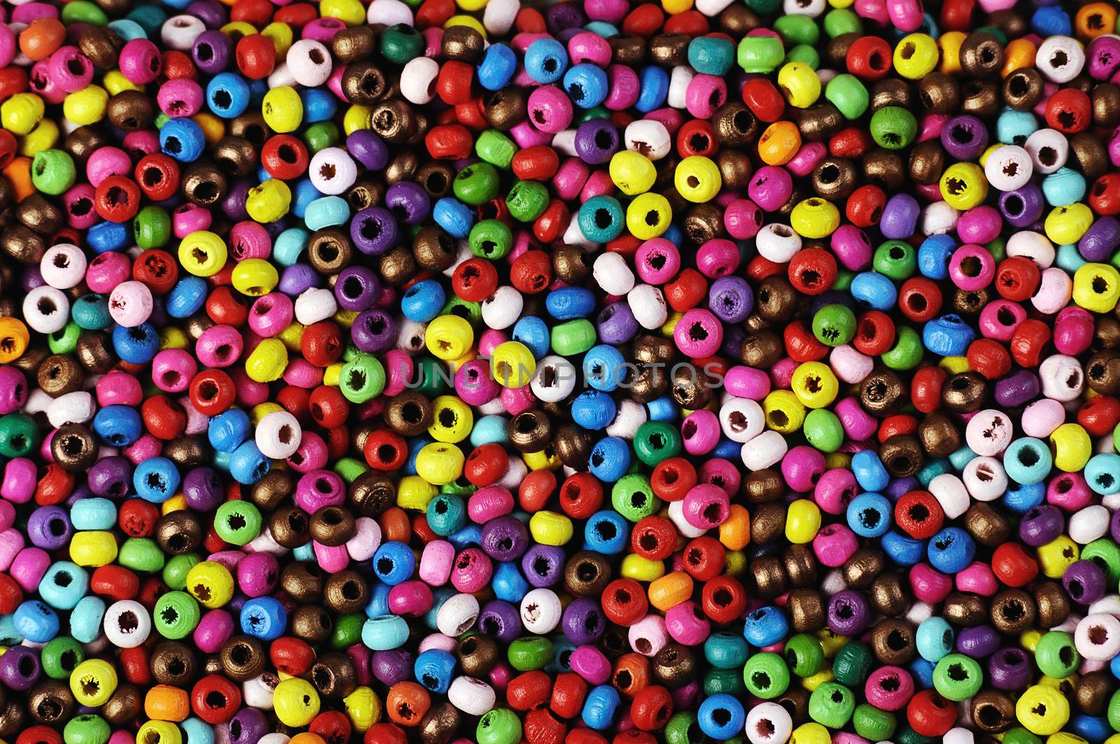 texture of small varicolored  beads ,suitable for backgrounds