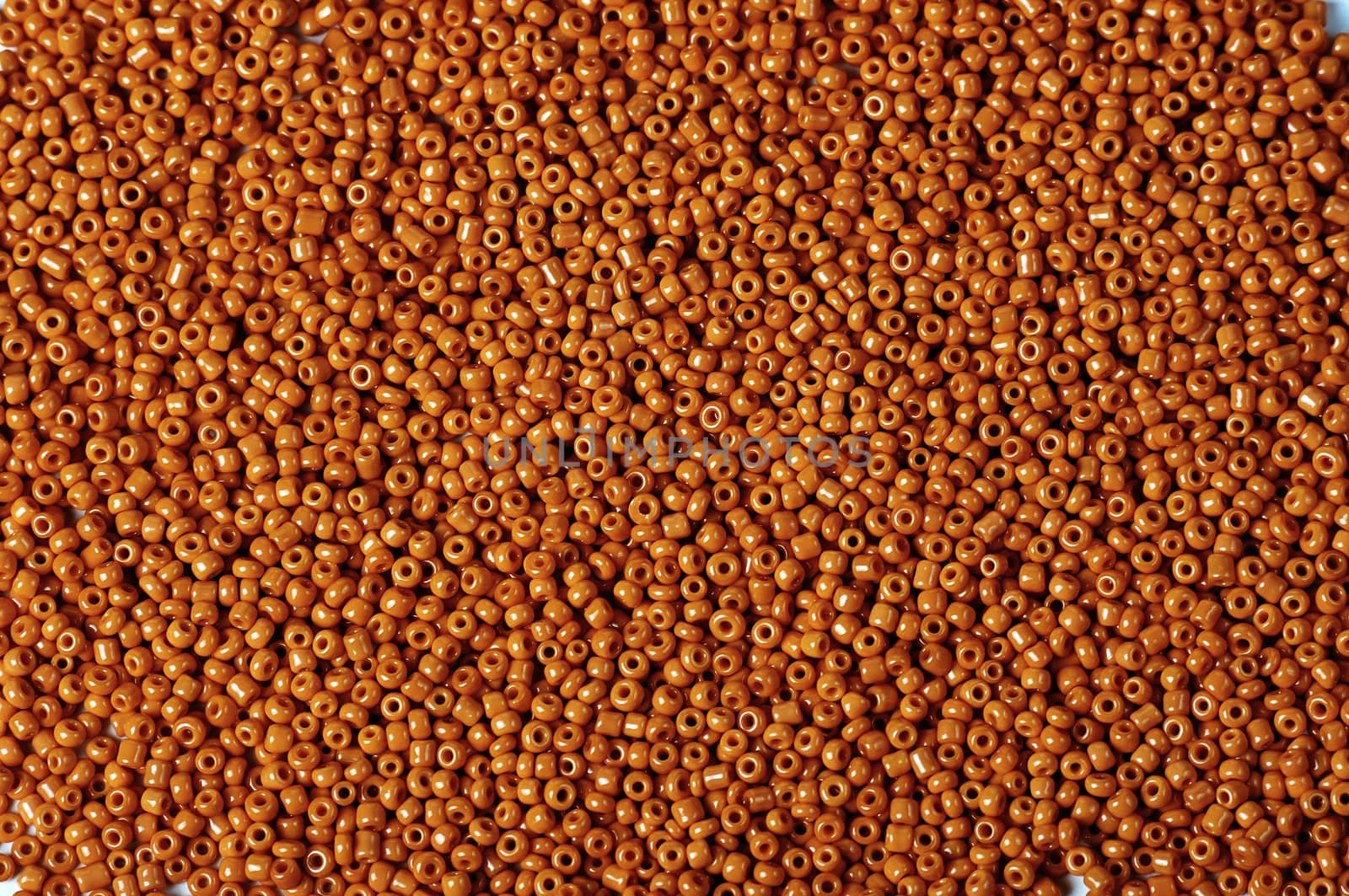 texture of small orange beads ,suitable for backgrounds