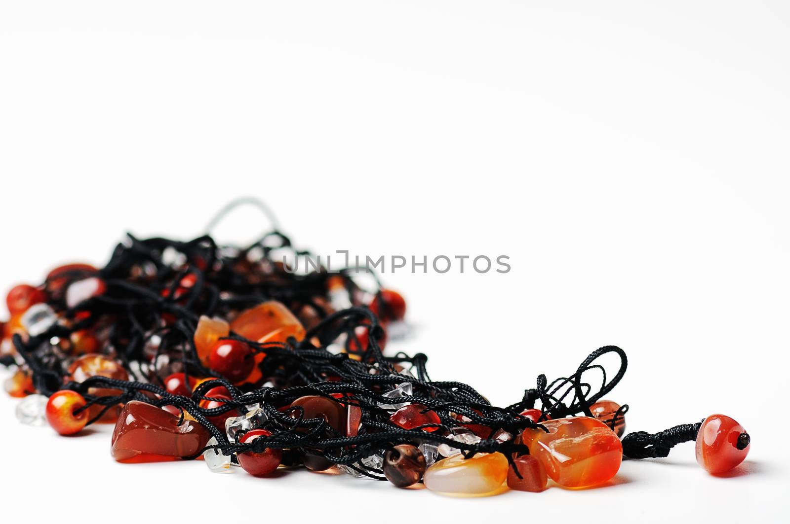 Beautiful  necklace closeup on white background  and space for text