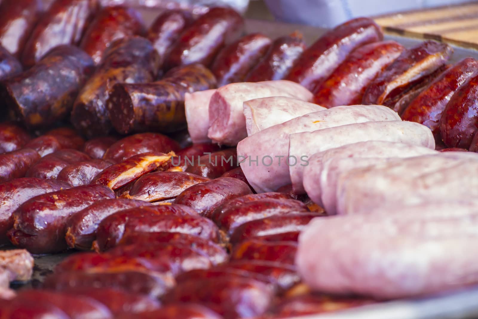 Grilled artisan sausages in a medieval fair