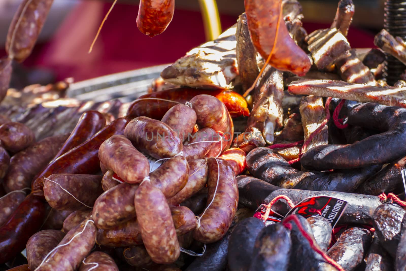 Cooked artisan sausages in a medieval fair