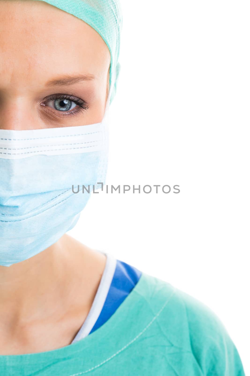 Portrait of a pensive/sad/exhausted female doctor/surgeon on white background