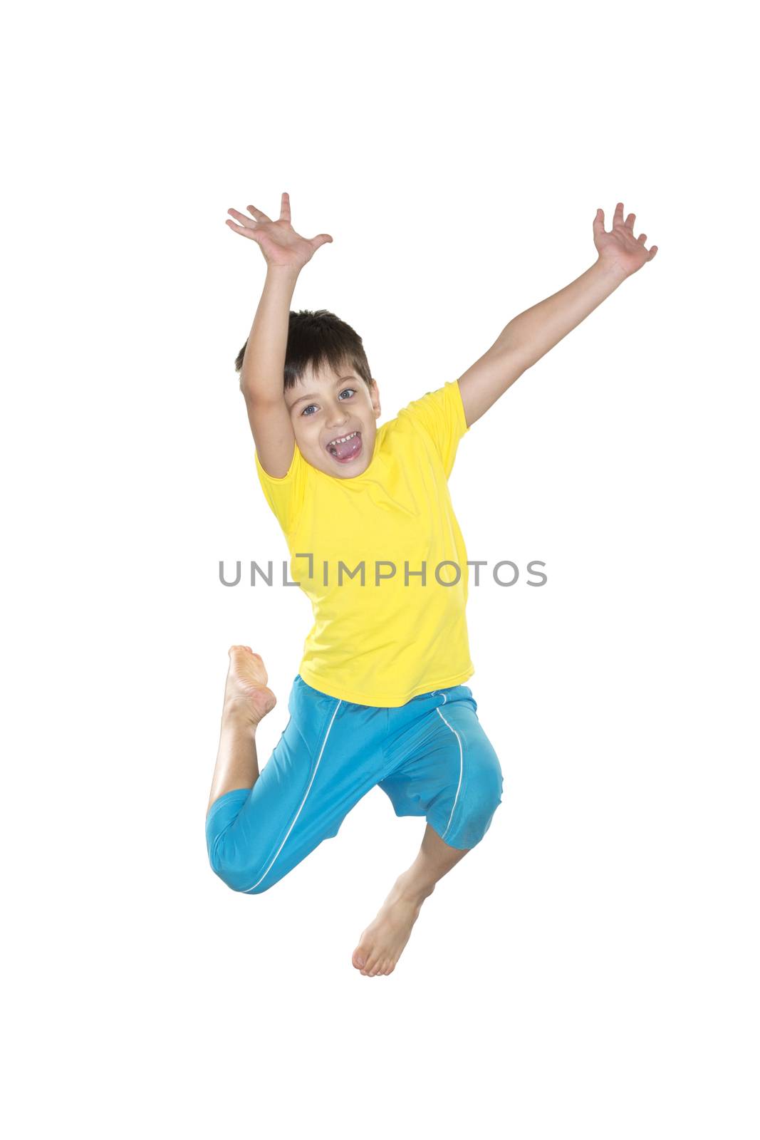 Brazilian Boy, jumping, yellow and blue. by BrazilPhoto