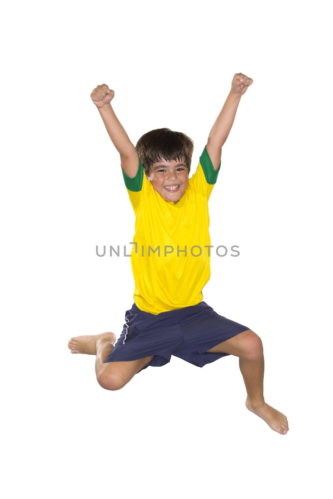 Brazilian Boy, jumping, yellow and blue by BrazilPhoto