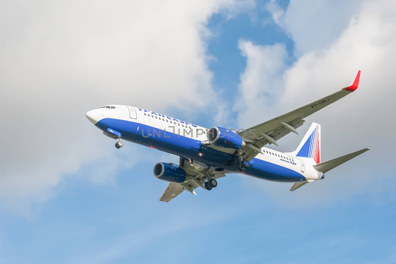London, Heathrow, UK - October 30, 2012: Operated by Russian Federation airline Transaero, a Boeing 737 on landing approach to London Heathrow Airport, UK