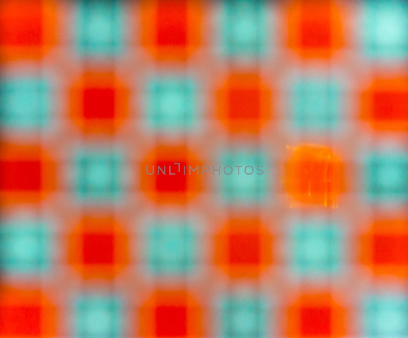 non specific pattern of colorful dots and squares on various color of background