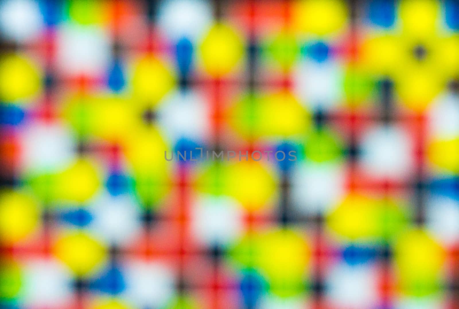 non specific pattern of colorful dots and squares on various color of background