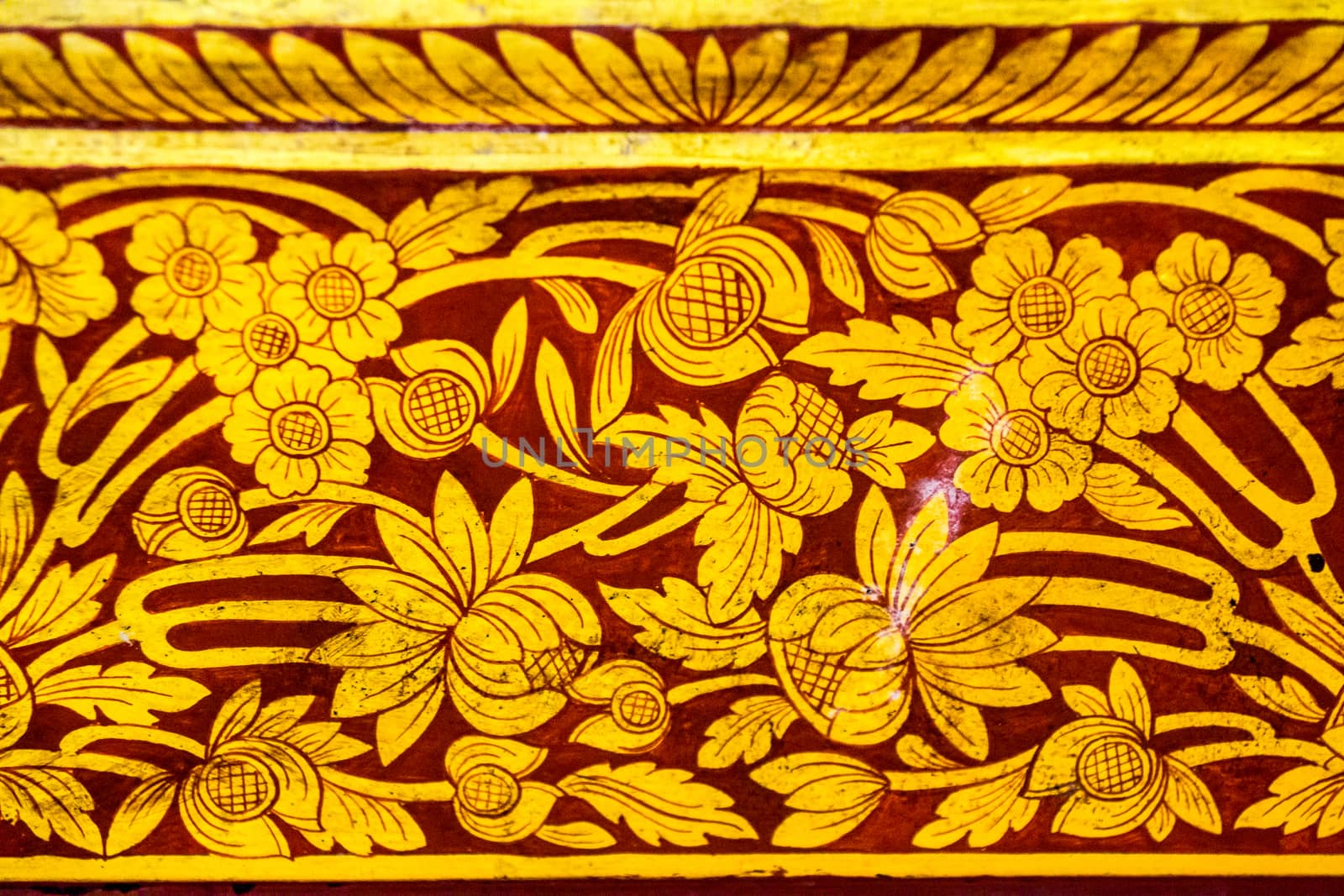 detail of thai pattern on ancient wooden casket