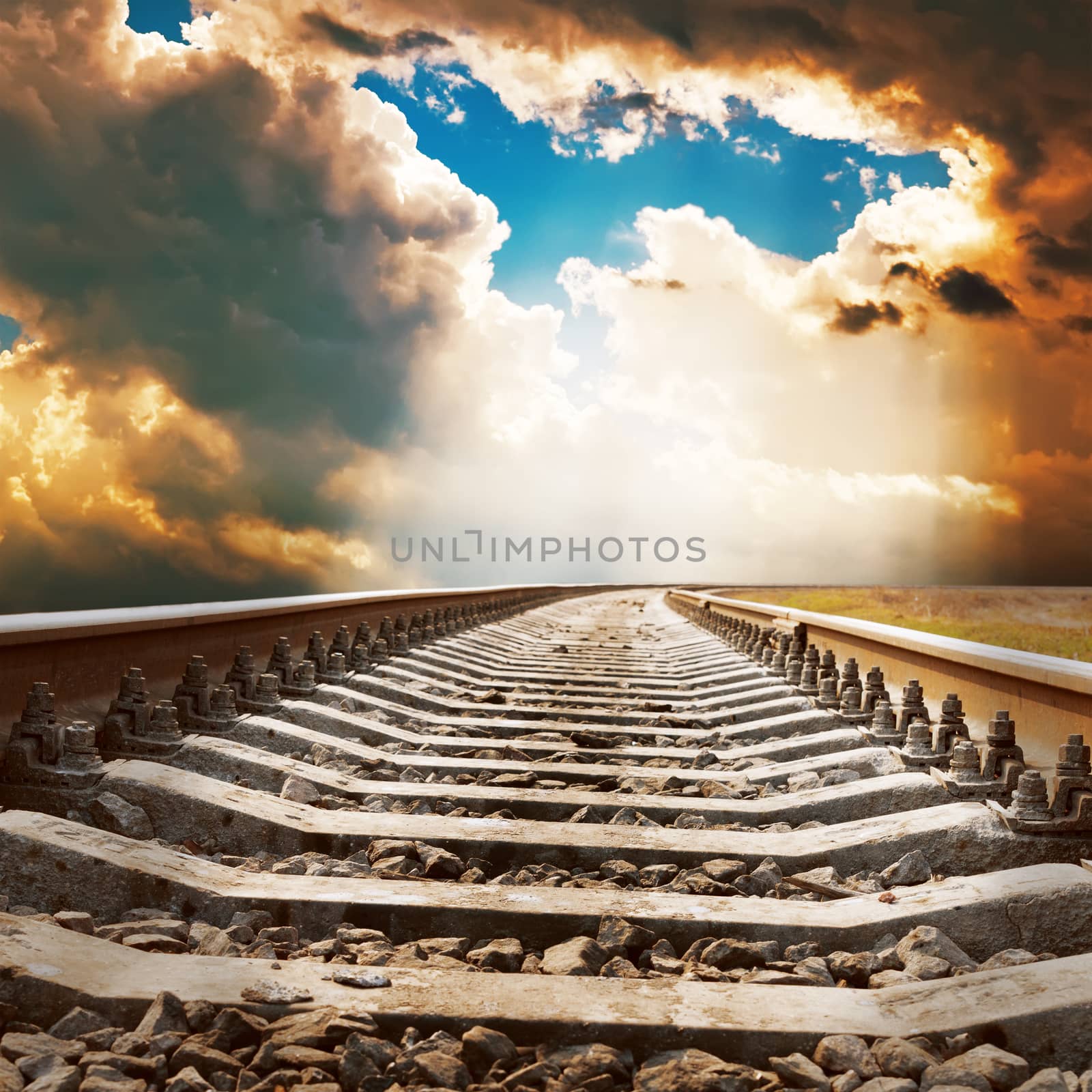 dramatic sky over railroad by mycola
