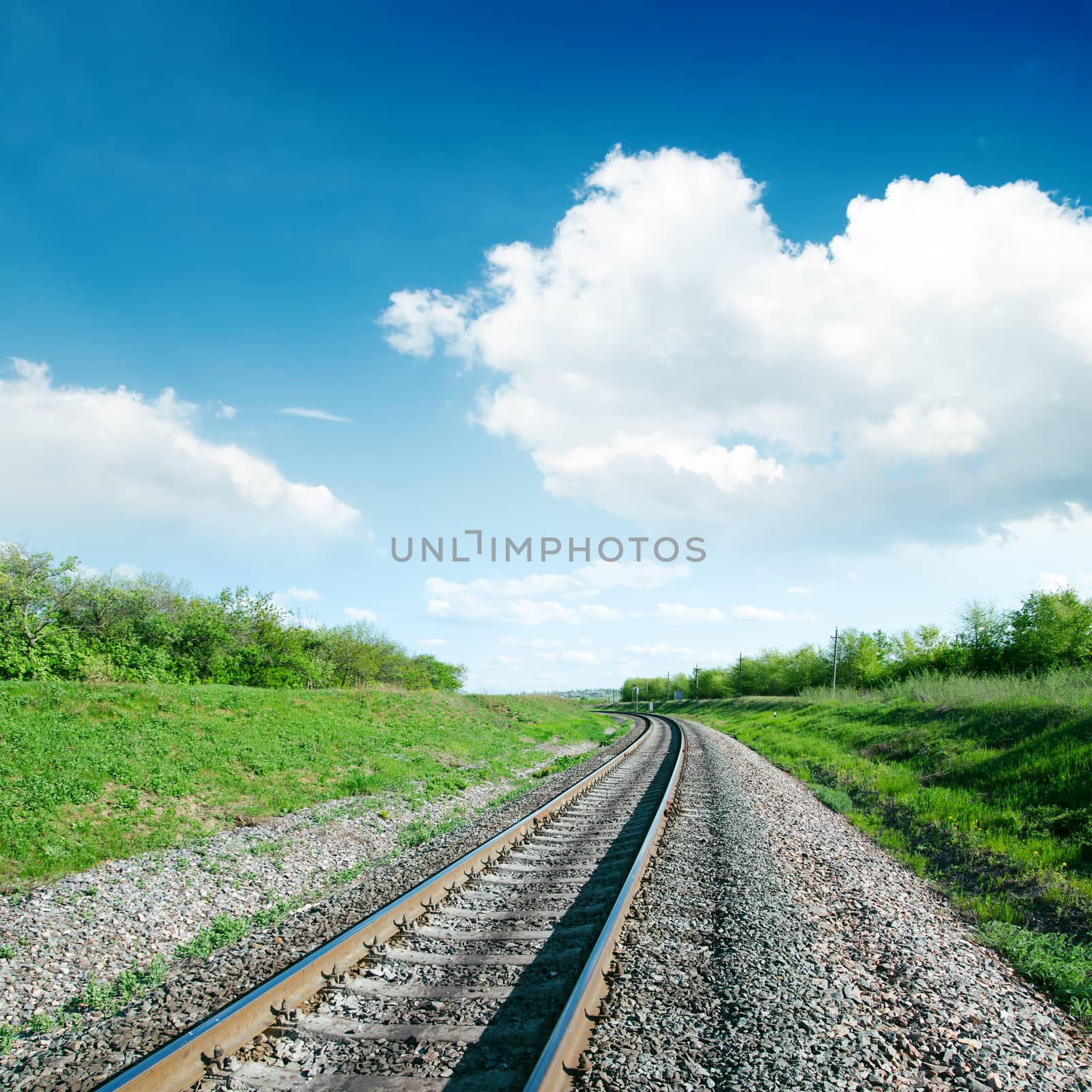 white clouds over railroad by mycola