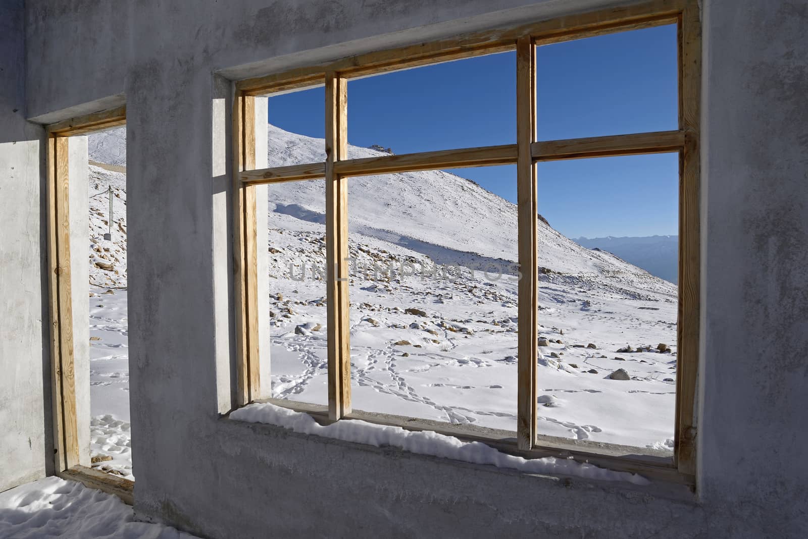 Window shot of Leh ladakh snow mountain background by think4photop