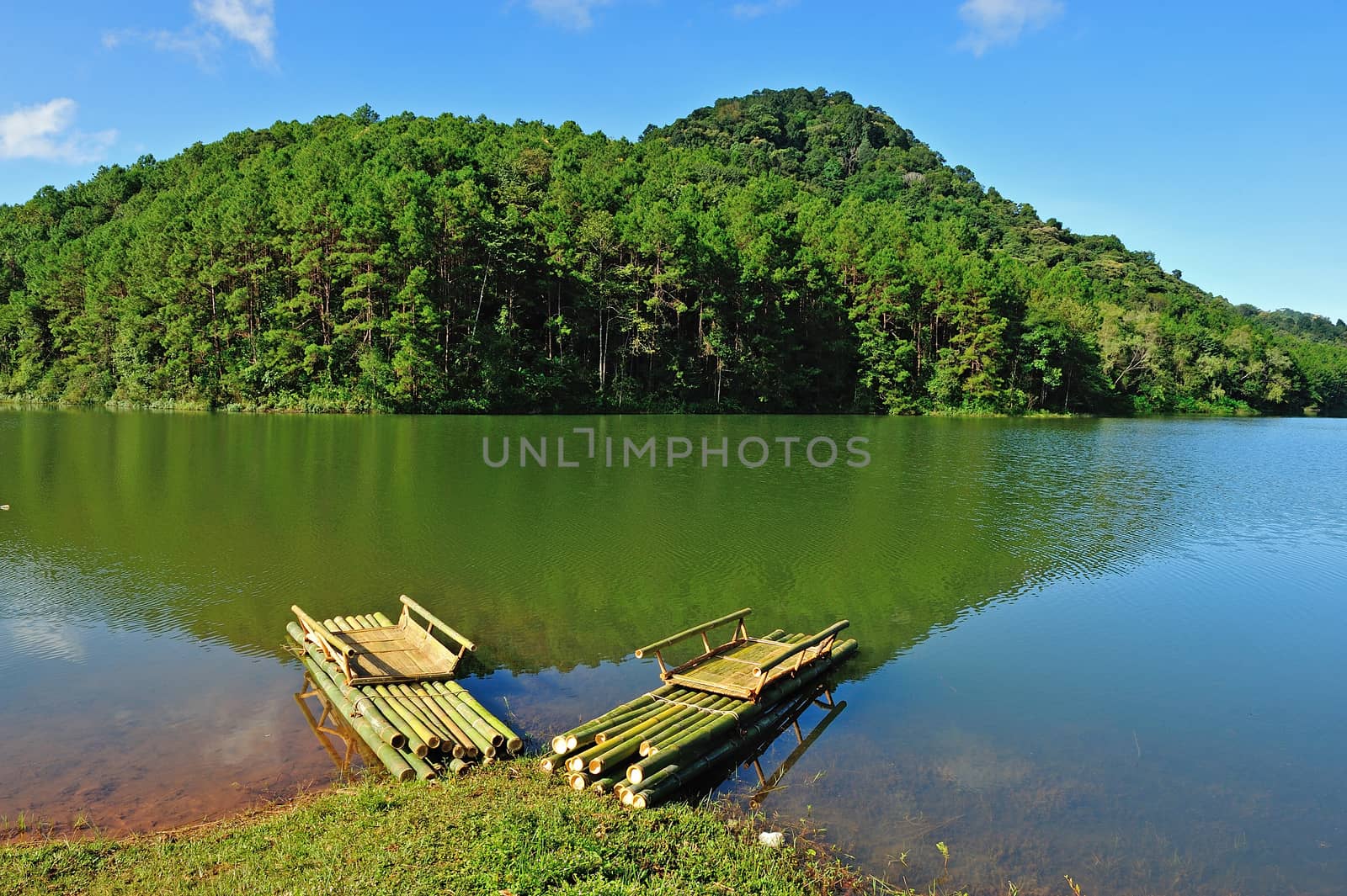 Bamboo raft on Pang Ung reservoir lake, Mae Hong son, Thaialand. by think4photop