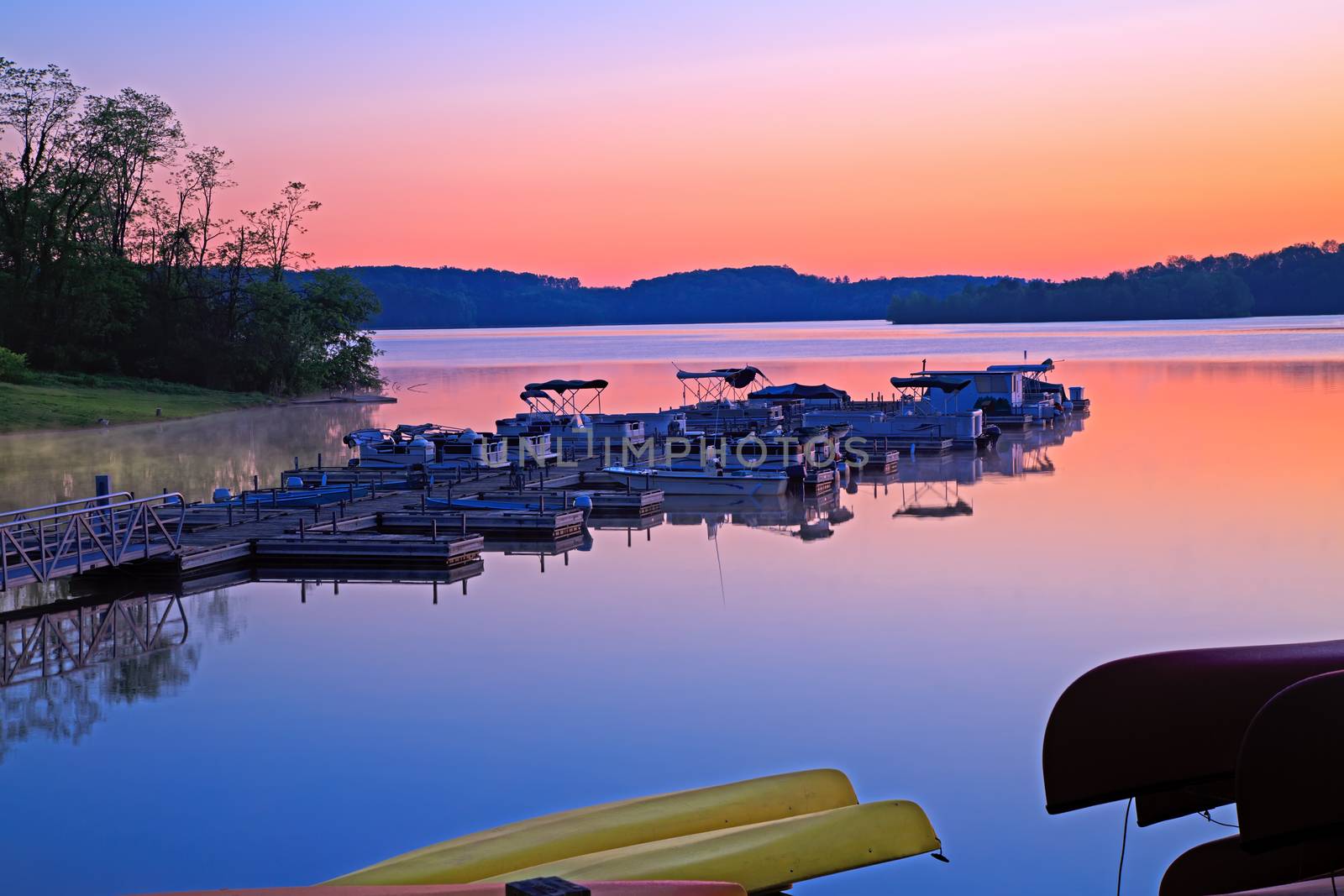Boats at sunrise on Lake Marburg in Codorus State Park, York County, Pennsylvania, USA.