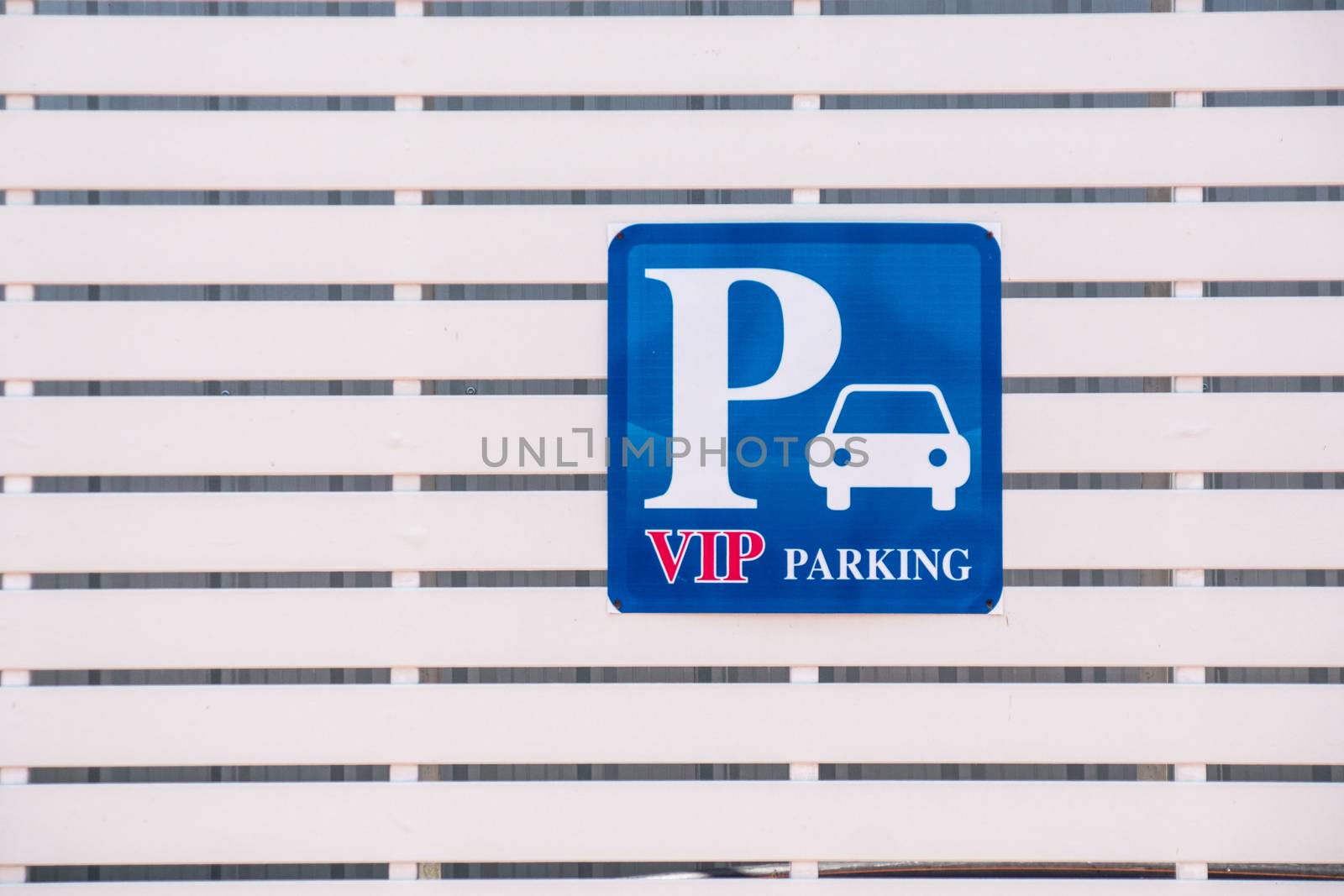 vip parking sign on white wooden wall,shallow focus