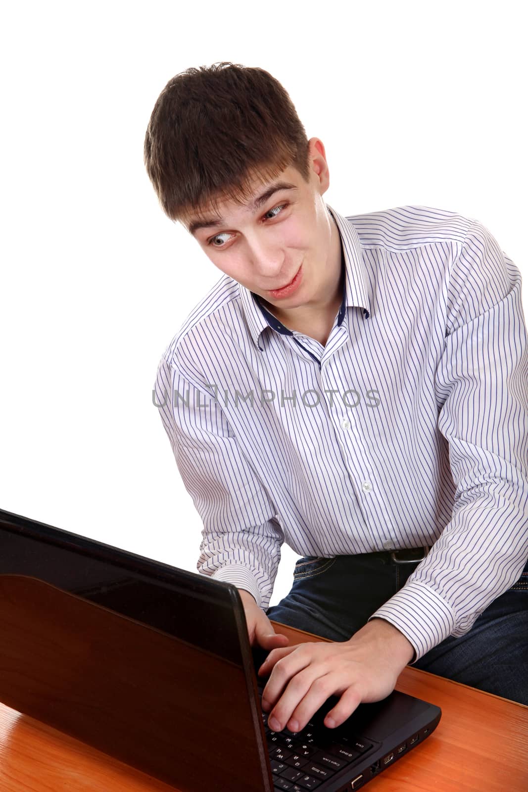 Doubtful Teenager with Laptop Isolated on the White