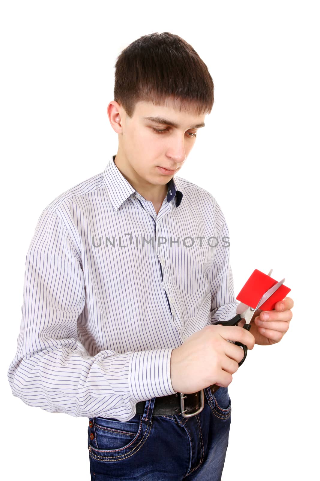 Teenager cutting a Credit Card Isolated on the White Background