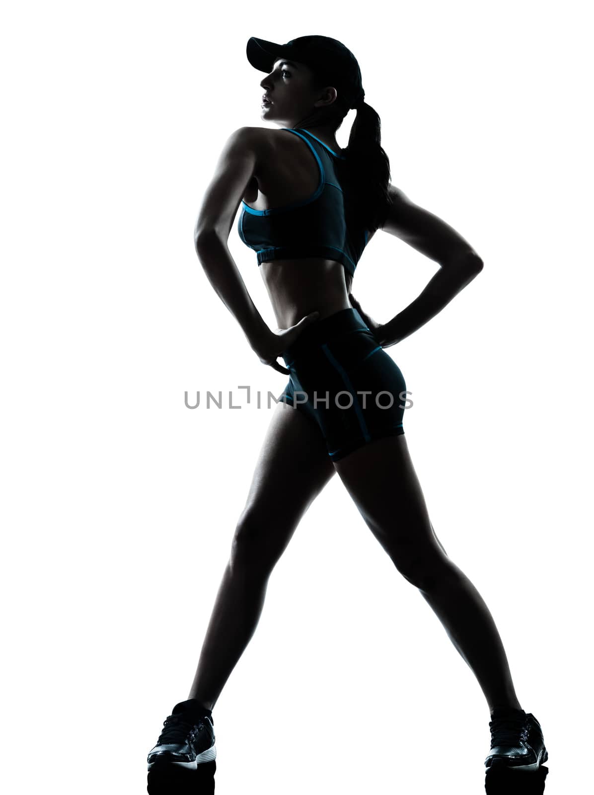 one  woman runner jogger in silhouette studio isolated on white background