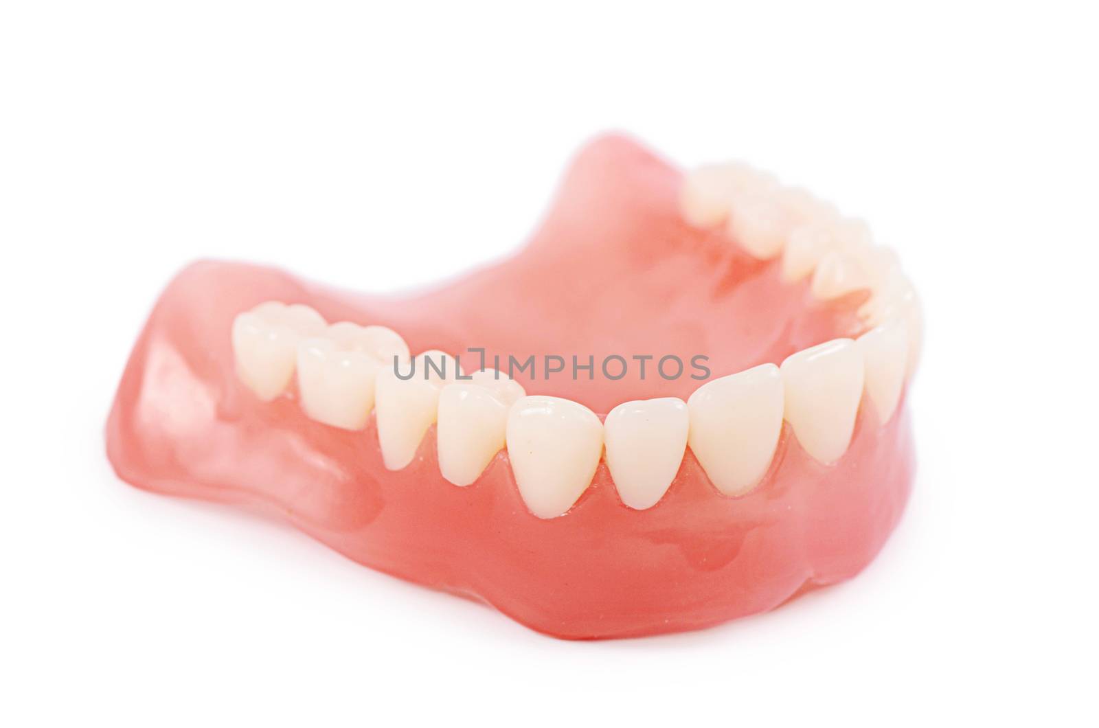 Set of false teeth isolated on white background by SvetaVo