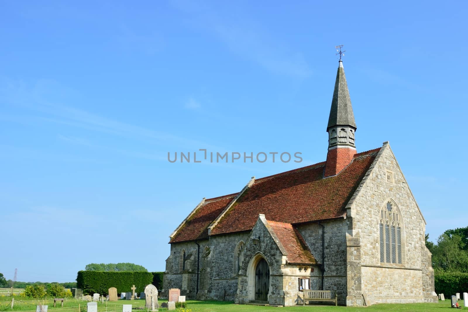 Rural english parish church in country by pauws99