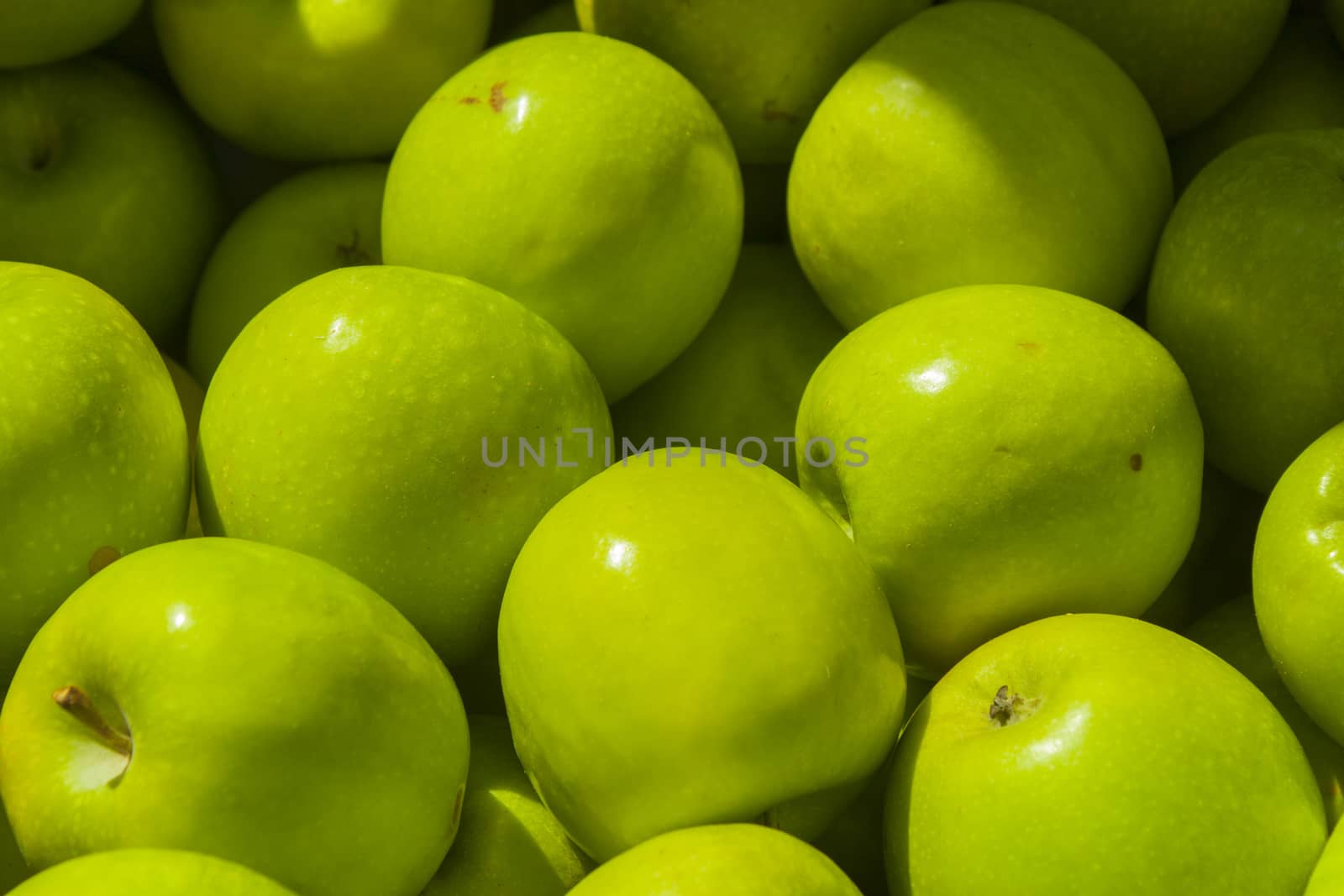 pile of green apples on market in netherlands