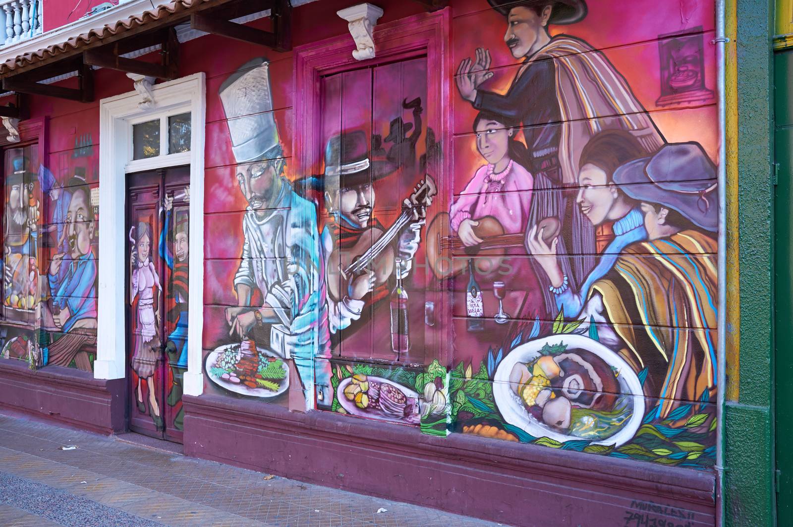 Brightly colored murals in Barrio Bellavista, Santiago, Chile. This neighborhood is renowned for its street art and for its many cafes, restaurants and bars.