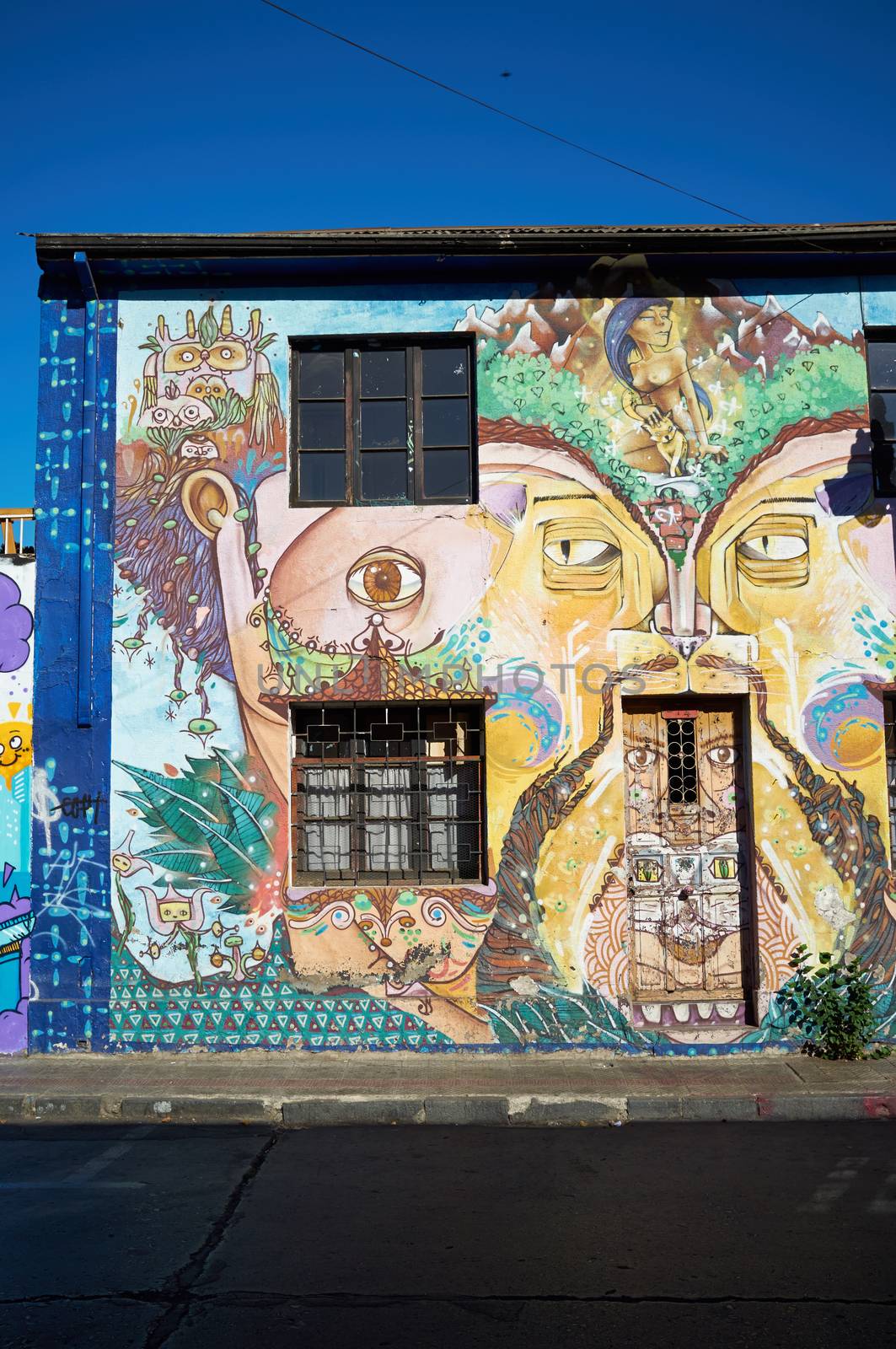 Brightly colored murals in Barrio Bellavista, Santiago, Chile. This neighborhood is renowned for its street art and for its many cafes, restaurants and bars.