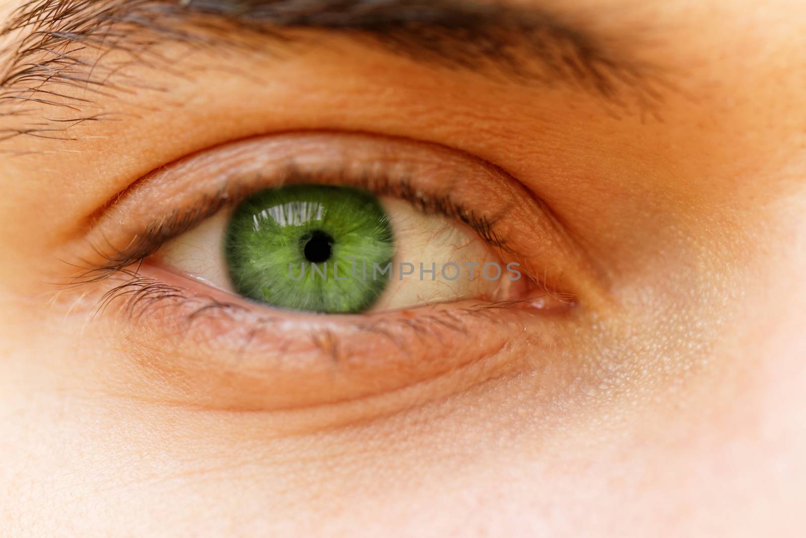 Close up photo of a beautiful young man's eyes