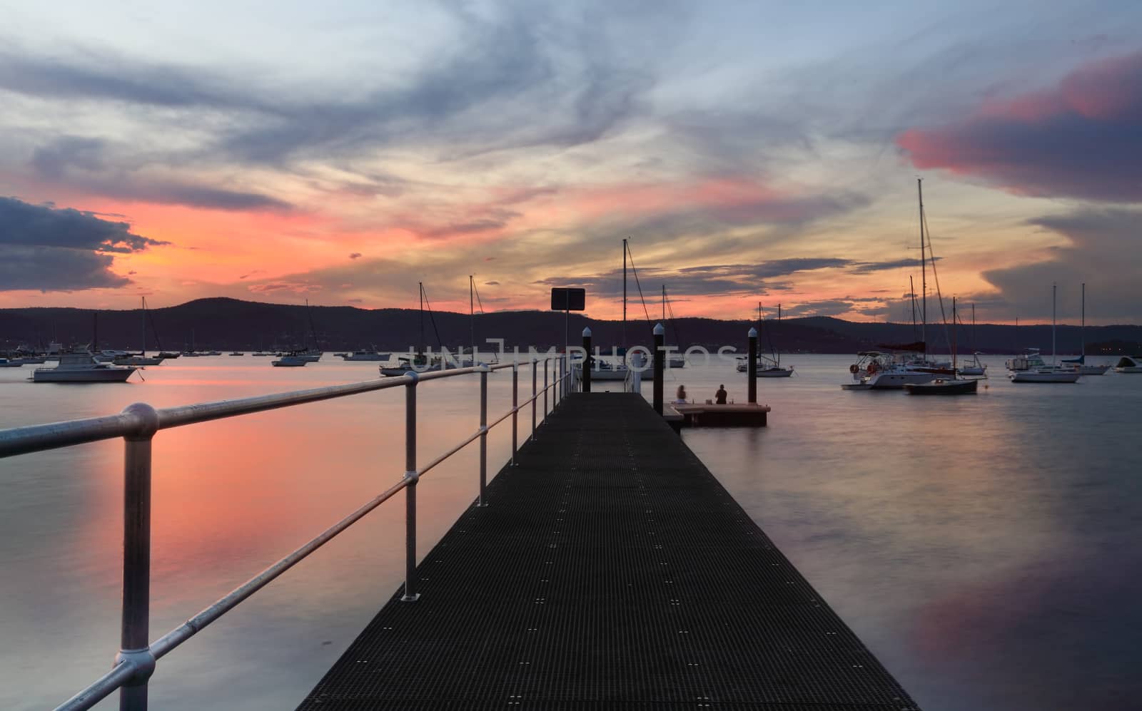 A peaceful evening and sunset from the  New Brighton Public Wharf, Saratoga.  Some boats have motion 4sec exposure