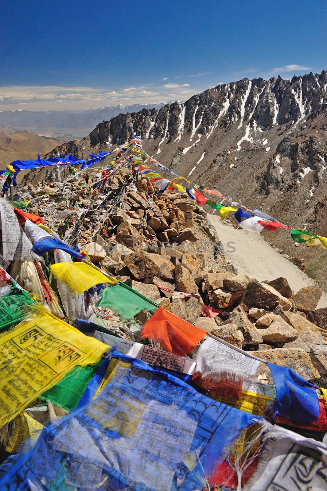Tibetan flag at Khardungla Pass (The highest road in the world), by think4photop