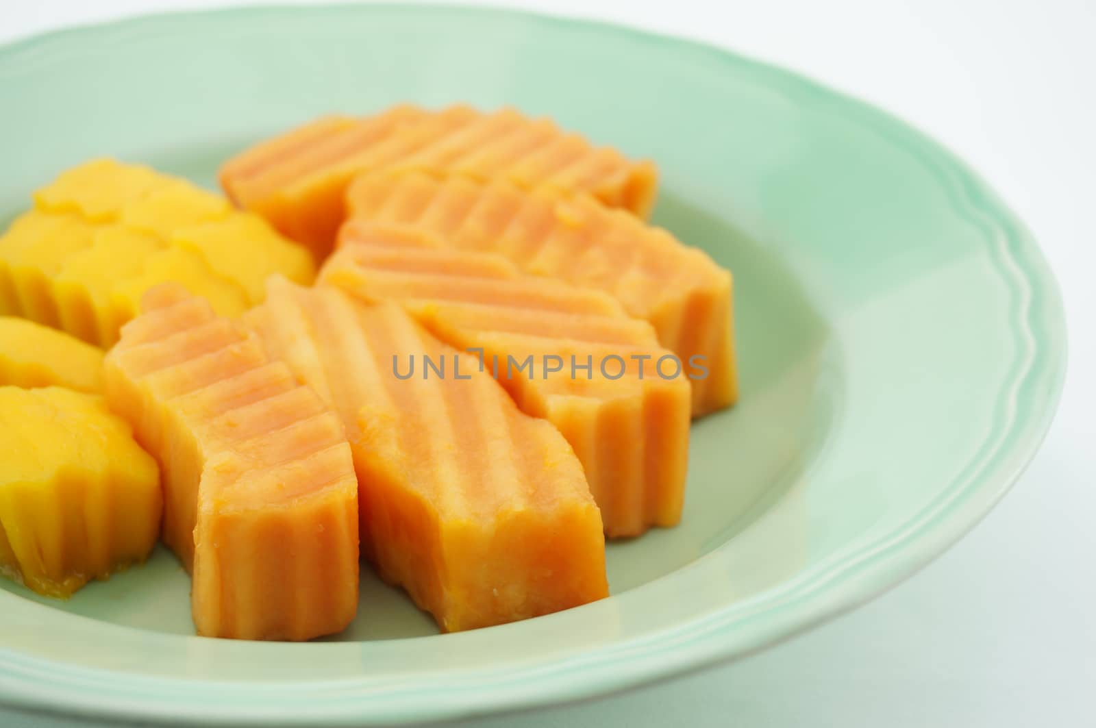 Papaya  and Mango on dish by eaglesky