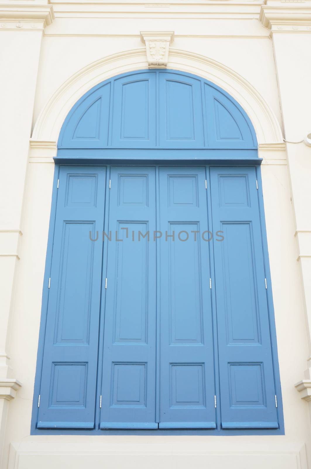 Large blue windows of the building, which is located on the Temple of the Emerald Buddha.