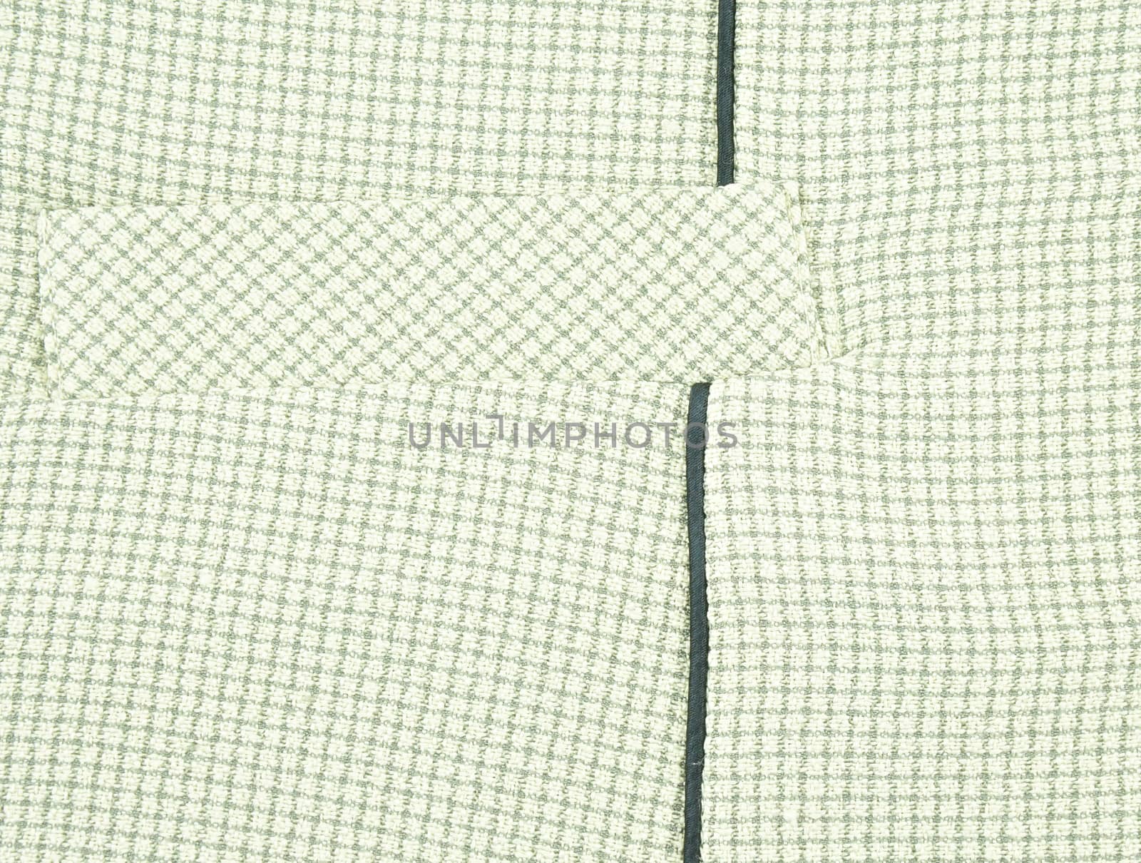 Background of pocket on green shirt textile for woman with square pattern texture.