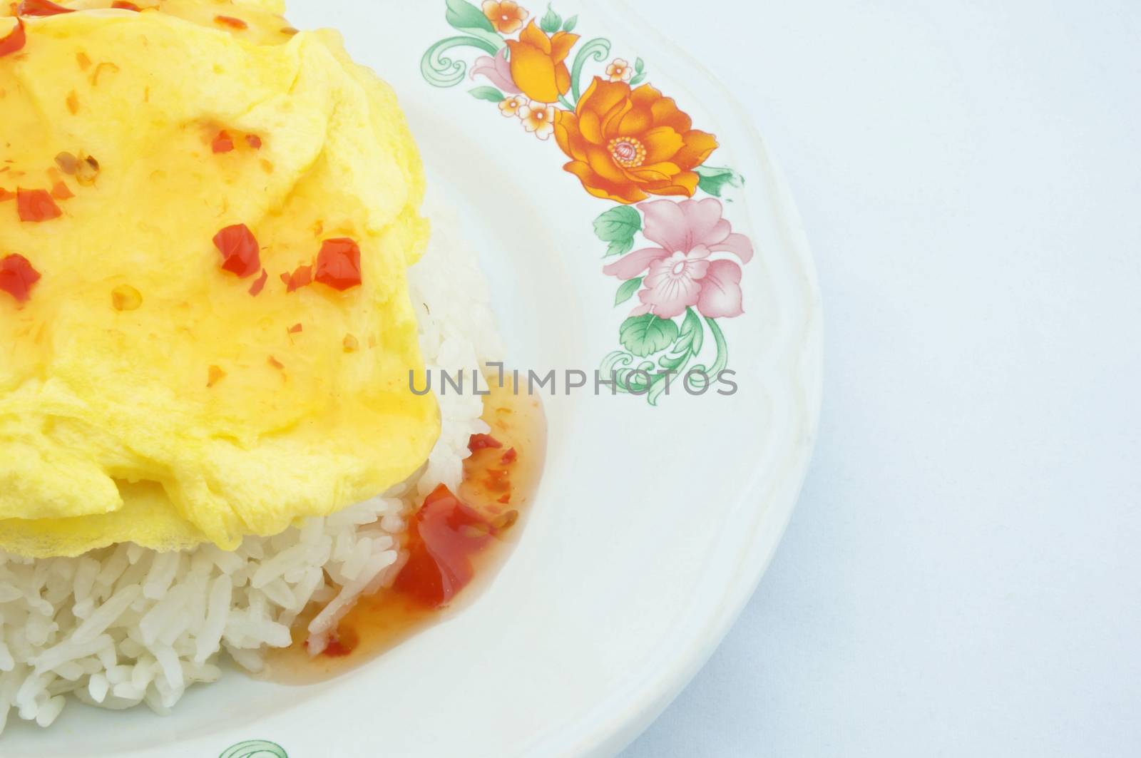 Triangle omelette on rice with  chill sauce by eaglesky