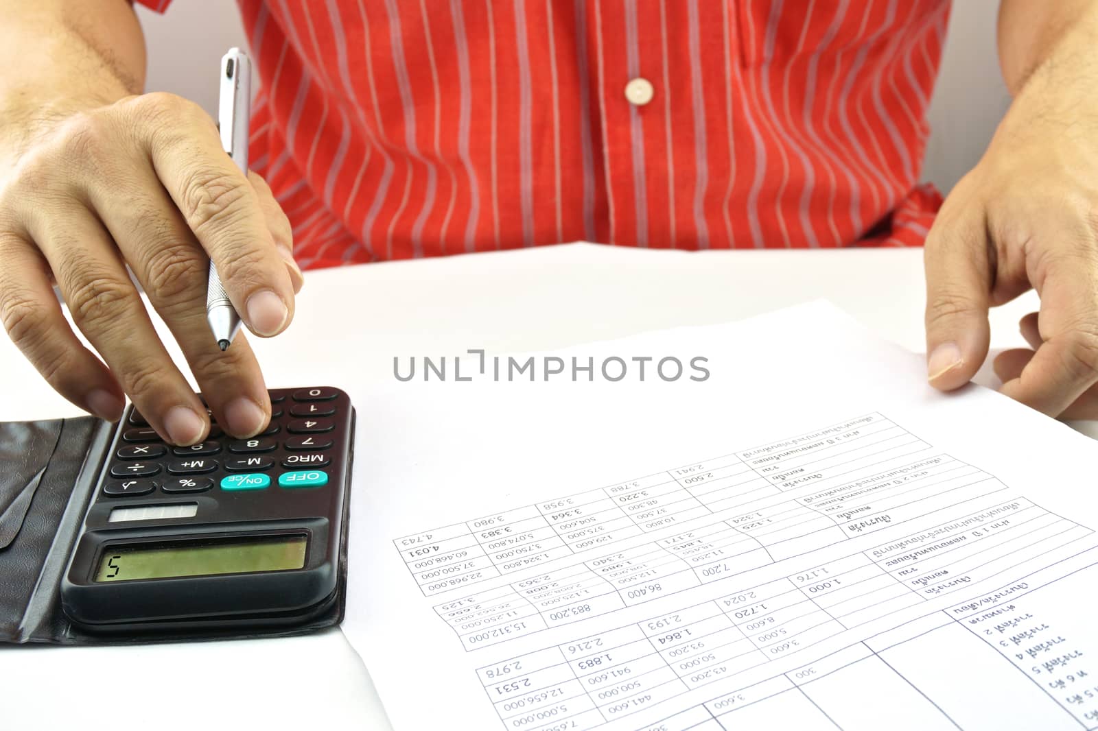 Man calculating interest rate of lottery for saving by eaglesky