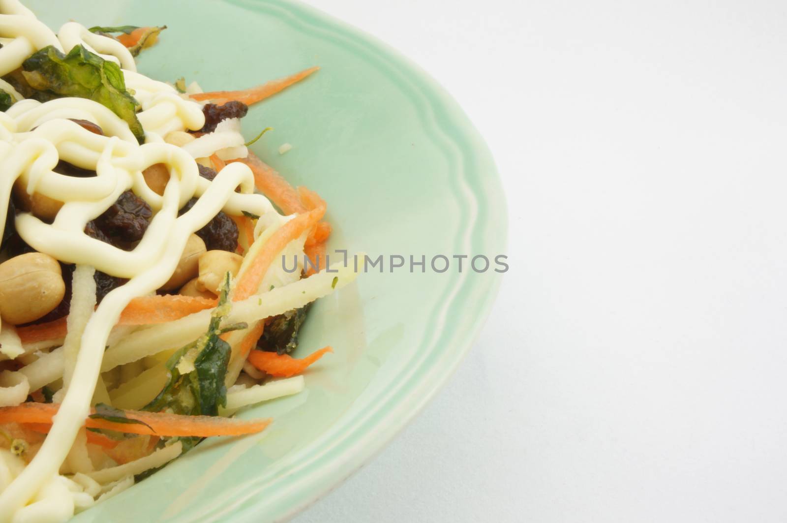 Salad with tomato raisins carrot and mayonnaise by eaglesky