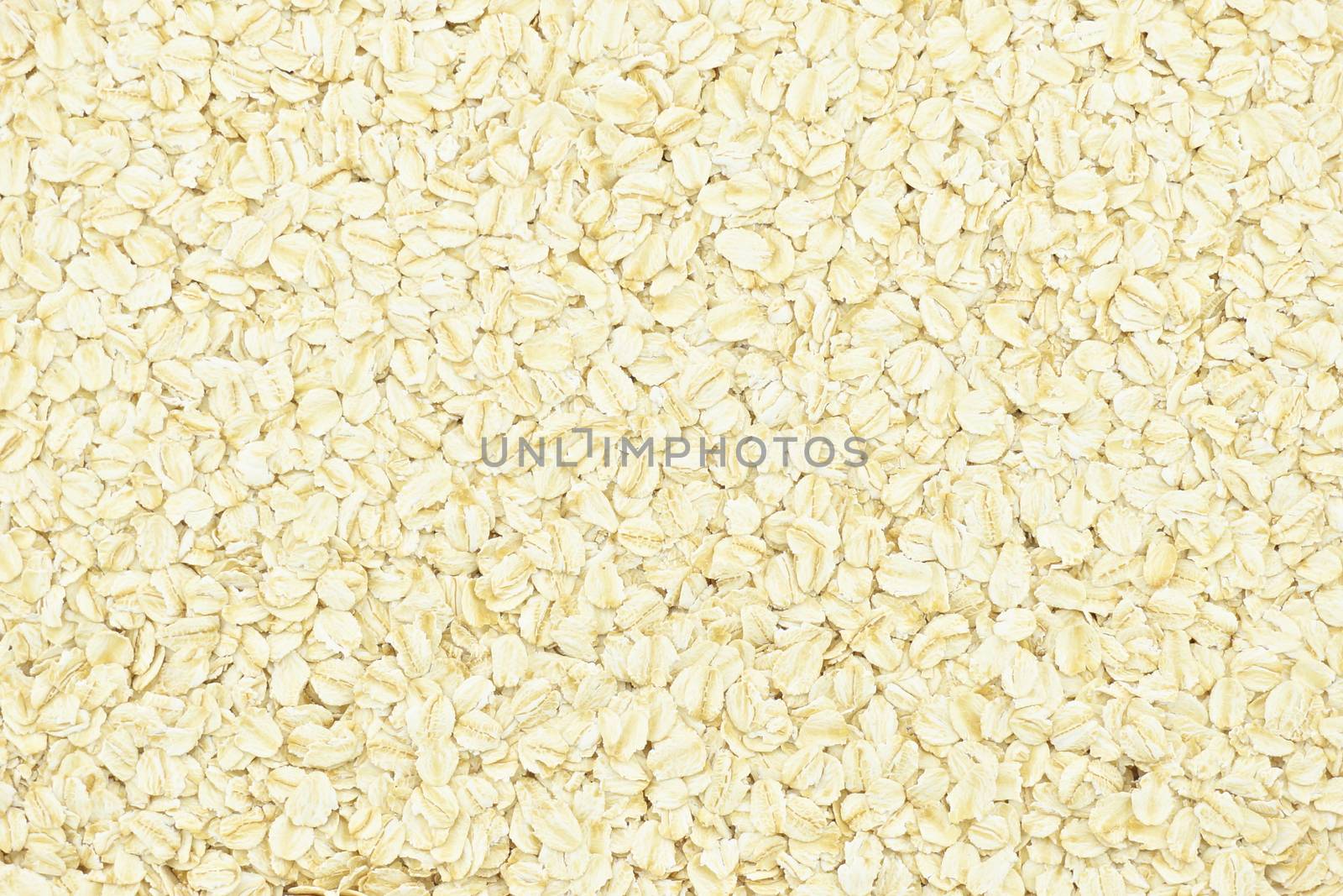 Porridge oats or oatmeal background by eaglesky