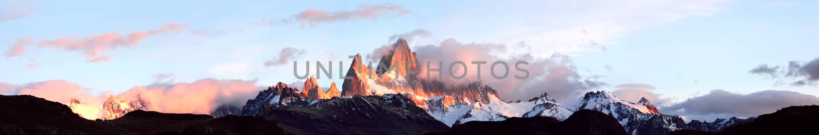 Andes in the fire. Giant panorama of mountain range Fitz Roy, Glaciers National Park Argentina, Patagonia