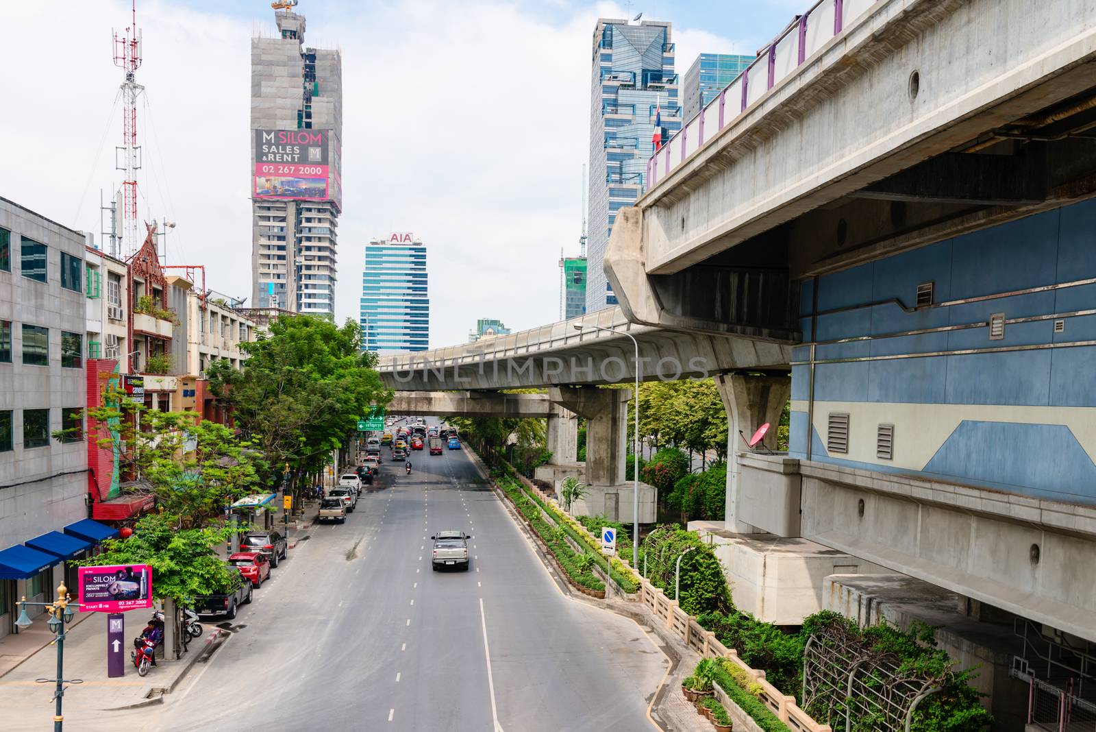Skytrain BTS station and track under street in Bangkok, Thailand by iryna_rasko