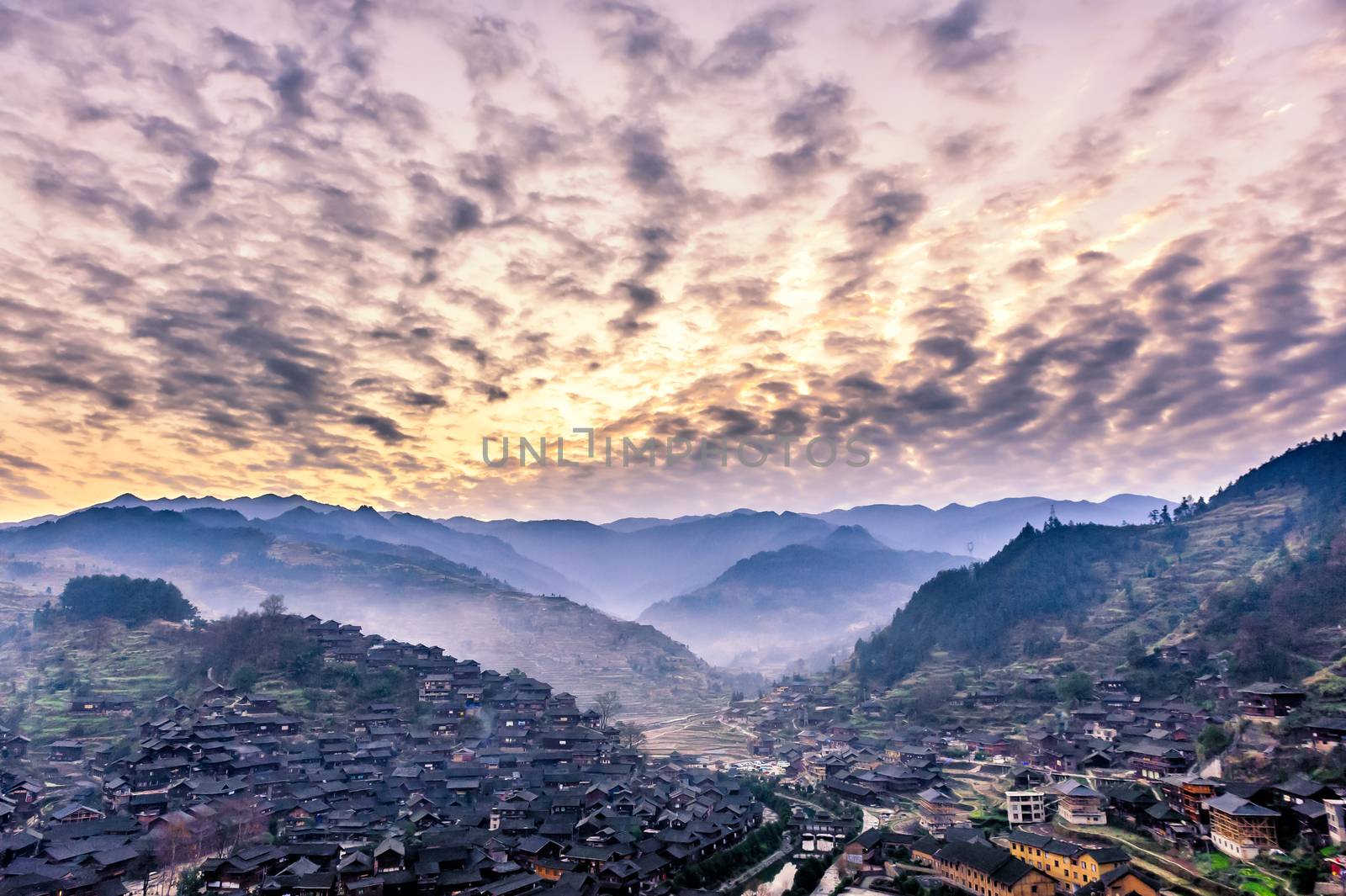 Xijiang miao village, largest village in Guizhou Miao ethnic minority under the morning of sunrise.