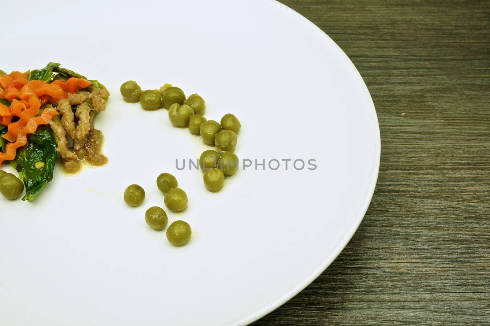 Chinese kale fried green peas, carrot, vegan protein dry and chilli vegetarian.